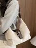 Bolso de mano sencillo y casual para mujer 2026 nuevo bolso de hombro retro coreano bolso cruzado de nicho para el trabajo