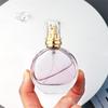 Em estoque frasco de perfume redondo rosqueável de 25 ml frasco de vidro com spray de metal marca cosmético baioneta frasco dividido