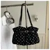 Bolso de axila negro de lunares para mujer 2026 nuevo de moda de alta gama ligero de nicho para ir al trabajo de gran capacidad