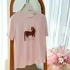 Camiseta de manga corta de algodón puro con estampado de poni estilo retro americano para mujer, ajuste holgado de verano, adelgazante, top de estilo casual, artículo popular 2026