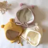 Touca de Bebê Outono e Inverno Urso Sem Costura Fofa Duas Bolas Quente Proteção de Orelha Touca para Recém-Nascido Touca Fetal Venda por Atacado