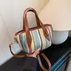 Bolsa de Palha Listrada Arco-Íris Transfronteiriça para Mulheres 2026 Nova Bolsa de Ombro Transversal Tecida Estilo Férias Bolsa de Praia