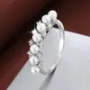 Anillo de Perla y Circonia de Venta Caliente Transfronterizo Corona de Flores de Circonia Engastada en Cuatro Garras Anillo Redondo con Múltiples Perlas Venta Directa de Fábrica