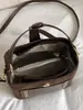 Bolso bandolera retro de nicho estilo coreano para el trabajo y los desplazamientos, que ofrece un ambiente relajado, nueva colección otoño 2026, bolso tipo cubo de alta calidad y moderno