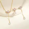 Alas de Ángel Moradas Micro-tachonadas con Diamantes y Pendientes de Perlas Estilo Ab de Nicho Diseño de Moda Collar con Borla Alta Gama