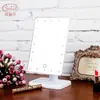 Suministro directo de fábrica escritorio puede girar 180 grados 20 LED brillantes espejo de un solo lado escritorio LED espejo cosmético al por mayor