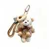 Llavero de osito suave y esponjoso suéter tejido gorro muñeco colgante muñeco lindo amuleto de bolsa de muñeco regalo pequeño