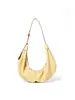 Bolso cruzado de piel para mujer Nuevo Bolso de hombro pequeño ligero para mujer Bolso tipo Dumpling de lujo ligero Bolso de cuerno de vaca de diseñador
