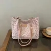 Comercio exterior al por mayor estilo fresco y casual 2026 tela Oxford simple estampada gran capacidad bolso de hombro para dama commuter