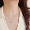 Collar Cruzado Europeo y Americano Personalizado de Metal con Forma de Corazón y Lazo, Cadena para Clavícula Elegante, Sencilla y de Diseño