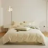 2026 Novo Conjunto de Roupa de Cama de Algodão Quatro Peças 100% Algodão Flanela Escovada Grau para Dormir Nu Lençol de Casa Capa de Edredom Classe A Estilo Simples