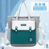 Bolso de mano para estudiante de primaria, bolso tutorial británico, bolso de hombro para estudiante de secundaria, mochila de mano, bolso tutorial, bolso de arte al por mayor