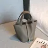 Bolsa Saco de Couro Bovino de Primeira Camada 2026 Nova Versátil Bolsa Tote de Couro Genuíno Bolsa Feminina Bolsa de Mão de Alta Qualidade