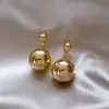 Pendientes retro de letras geométricas de alta calidad, diseño de nicho simple, pendientes de moda que combinan con todo.