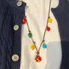 Collar trenzado de manzana de color dopamina para mujer 2025 Nuevo lindo cadena larga para suéter halter colgante accesorios