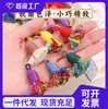 Colgante de borla mini Xizang tamaño pequeño borla mano frotar hilo de algodón texto jugar pulsera de alta calidad colgante accesorios de mano DIY