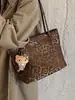 Bolso de mano retro estilo coreano, gran capacidad, diseño nuevo, adecuado para ir al trabajo y uso casual, bolso de compras con estampado de leopardo para mujer