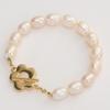 Pulseira Flor Ouro Cobre pérola natural de água doce feminina fecho ot pulseira moda europeia e americana temperamento versátil pulseira atacado