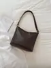 Atacado transfronteiriço nova bolsa feminina popular retro textura trançada bolsa sacola balde moda sob o braço ombro único transversal bolsa feminina