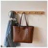 2026 Nueva Bolsa de Gran Capacidad para Mujer Otoño e Invierno Casual Simple Bolso de Hombro Textura Clase Bolso Tote para Viaje