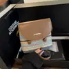Bolso de Paja Tejido a Mano con Rayas para Mujer, Nuevo Bolso Cruzado Tipo Cubo de Nicho Verano 2026, Bolso de Playa para Vacaciones en la Costa