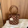 Bolso de hombro informal transfronterizo para el día a día, diseño nicho estilo coreano de lunares, nuevo bolso cubo 2026, bolso grande de mujer