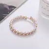 Corea del Sur joyería nupcial pulsera elástica de diamantes completos pulsera de múltiples capas de perlas y pedrería en espiral pulsera al por mayor