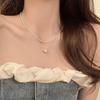 Collar de perlas apiladas de doble capa para mujer, elegante collar de nicho con diseño de alto nivel, cadena de clavícula, nuevas explosiones 2023