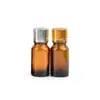 Botella de aceite esencial marrón de 10 ml venta directa de fábrica más estilos en stock cuentagotas de subenvasado botella de vidrio