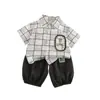 Conjunto Curto de Verão 2026 para Meninos, Camisa Estilosa com Estampa Xadrez Quadrado, Conjunto de Duas Peças com Shorts, Tendência