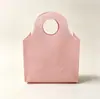 Bolsas de asa corta redondas no tejidas, bolsas de compras, bolsas ecológicas de ropa hechas a medida, bolsas de embalaje, en stock, con impresión de logotipo