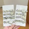 Pinza para el cabello de alta gama con forma de corazón de perla, pinza de pico de pato para flequillo lateral, pinza lateral de figura de ocho con pedrería para mujer