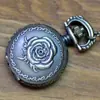 Versión coreana de reloj de bolsillo pequeño, reloj de bolsillo retro, reloj de collar para hombres y mujeres, fabricantes al por mayor 7009