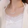Libro Caperucita Roja Flor de Glicina Sonrisa de Zhao Yingzi Collar Zirconia Cadena para Clavícula de Mujer Lujo Ligero de Alta Gama Nicho Venta al por Mayor