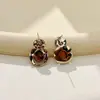 Brincos estilo vintage com pedra olho de tigre, toque de luxo, design exclusivo, versátil para o dia a dia