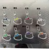 Hebilla de puerta colorida colgante gatito KT gato llavero bolsa de accesorios para manualidades decoración accesorios llavero al por mayor