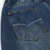 Pantalones de pierna curva de mezclilla lavada estilo retro americano, estilo punk callejero para hombre, pantalones largos de pierna ancha de corte holgado con aspecto desgastado y arrugado