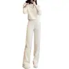 Conjunto de moda casual de alta gama para mujer, nuevo estilo chino de otoño, con una sudadera abotonada y pantalones anchos estampados, un conjunto de dos piezas moderno