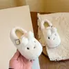 Zapatos de felpa con orejas de conejo para niños, nuevo estilo de invierno 2026, zapatos de algodón para bebé tipo princesa de color liso, calzado cálido