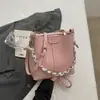 Bolso de Cubo de Mano para Viajes Diarios Mujer Verano 2026 Diseño de Nicho Nuevo Bolso de Hombro Único Bolso Cruzado Simple para Viajes Diarios