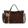 Bolso bandolera de un solo hombro texturizado, nuevo estilo para el trabajo, bolso tote de gamuza, versátil vintage 2026 para mujer, gran capacidad, al por mayor