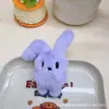 Lindo peluche de dibujos animados conejo de orejas rojas muñeco colgante broche bolsa zapato accesorio de ropa accesorio de juguete de peluche de conejo