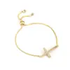 Pulseira Cruz Vazada de Venda Quente Moda Ajustável Joias com Zircônia Microincrustada Joia de Mão Versátil Personalizada para Mulheres