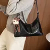 Bolso de hombro moderno para debajo del brazo para mujer, nuevo estilo 2026, con un toque de lujo, con diseño de caricatura, estilo retro y adecuado para el otoño