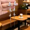 Brincos de franja de zircônia em formato de borboleta, inspirados no pôr do sol, etéreos e elegantes - um design luxuoso e sofisticado, incrivelmente bonito e versátil