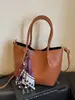 Bolsa tote de grande capacidade, minimalista e única - o novo design da moda de 2026, ostentando um visual estiloso, perfeita para uso casual, trabalho e deslocamento