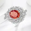 Transmisión en Vivo Venta Caliente Anillo de Mariposa Huevo de Paloma Cortado Flor de Hielo Piedra Preciosa Colorida para Mujeres, Anillo con Forma de Huevo de Diamante de Alto Carbono Súper Brillante, Venta al por Mayor de Una Pieza