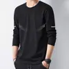 Camiseta masculina de manga comprida, camada interna de outono masculina, camiseta básica solta e elástica, camiseta masculina estampada estilo coreano ins
