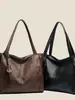 Bolso tote retro de moda nuevo para otoño 2026 transfronterizo, gran capacidad, adecuado para el uso diario, se puede llevar en la mano, usar como bolso de hombro o colgar cruzado