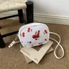 Moda Verano 2026 Alta Calidad Texturizado Estampado de Cerezas Simple Versátil Elegante Bolso Pequeño de Hombro Cruzado para Ventas Transfronterizas